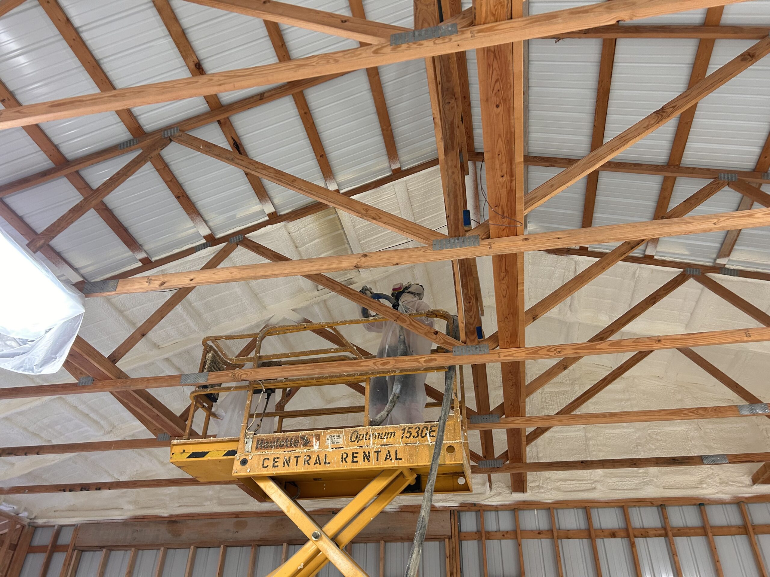 spray foam insulation installation on ceiling